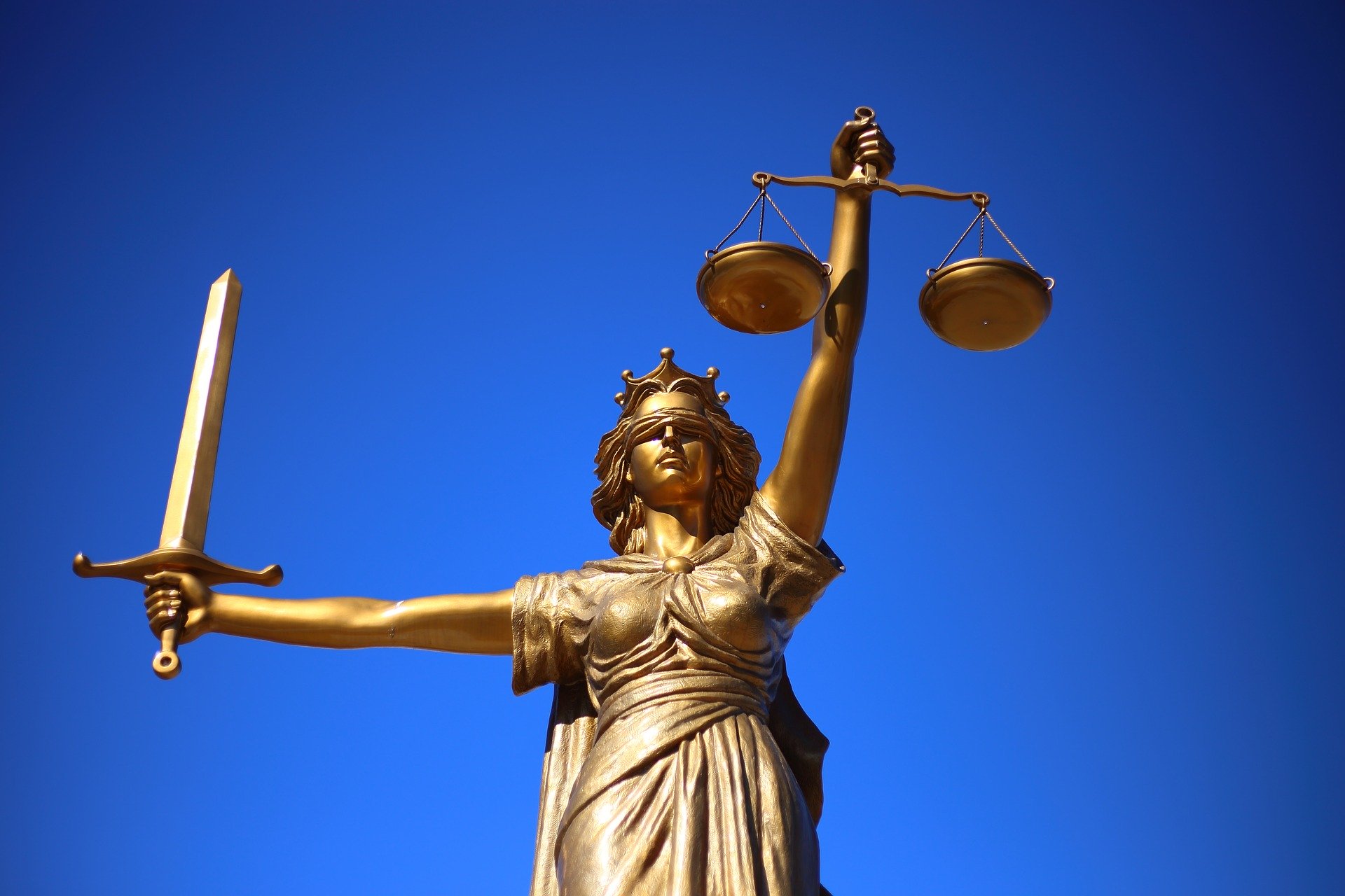 Justitia als Symbol für die rechtlichen Folgen des Punktehandels