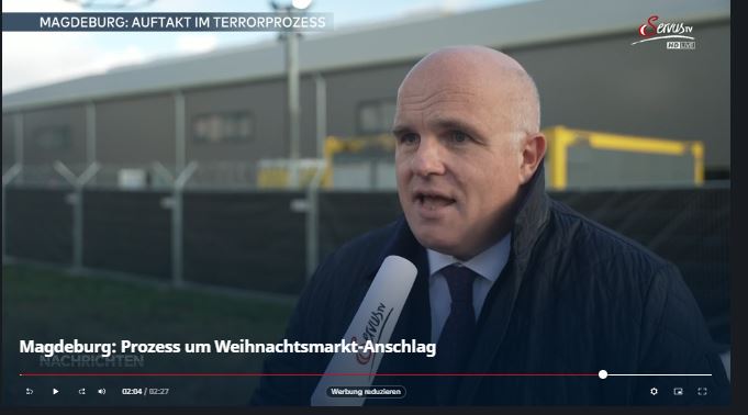 Das Standbild zeigt eine Momentaufnahme aus einem TV-Interview mit J. v. Rüden.